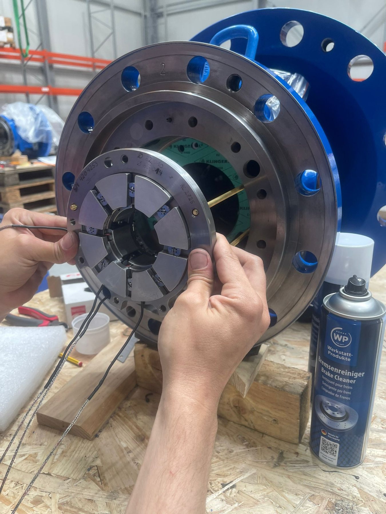 JCL engineer inspecting a turbomachine component